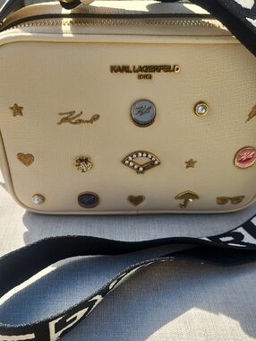Karl Lagerfeld Cream Crossbody w Gold-Tone Charm Embellishments & Guitar Strap